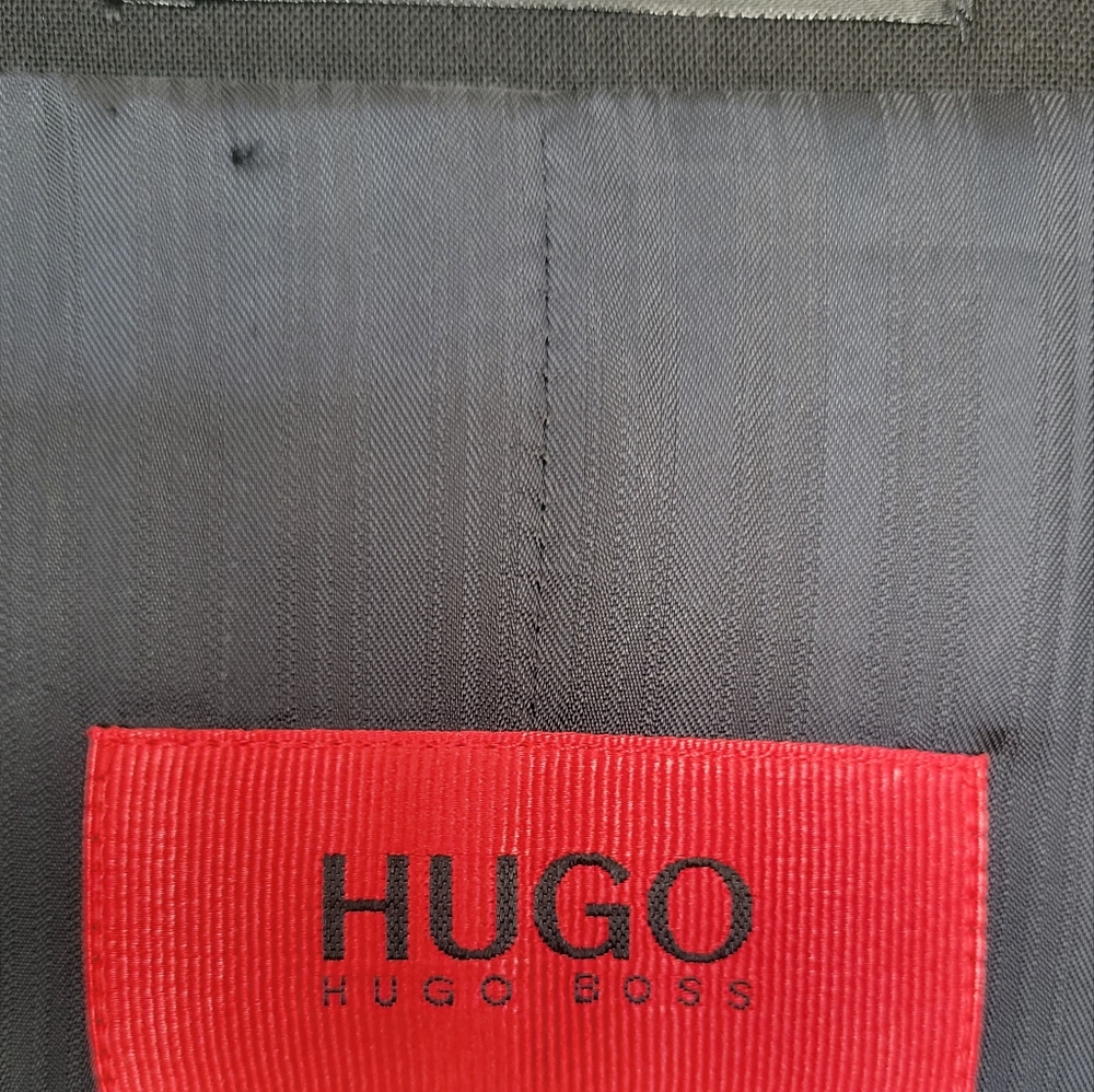 Hugo Boss dressy coat,  medium built fit,  worn only once.  Made in Germany.